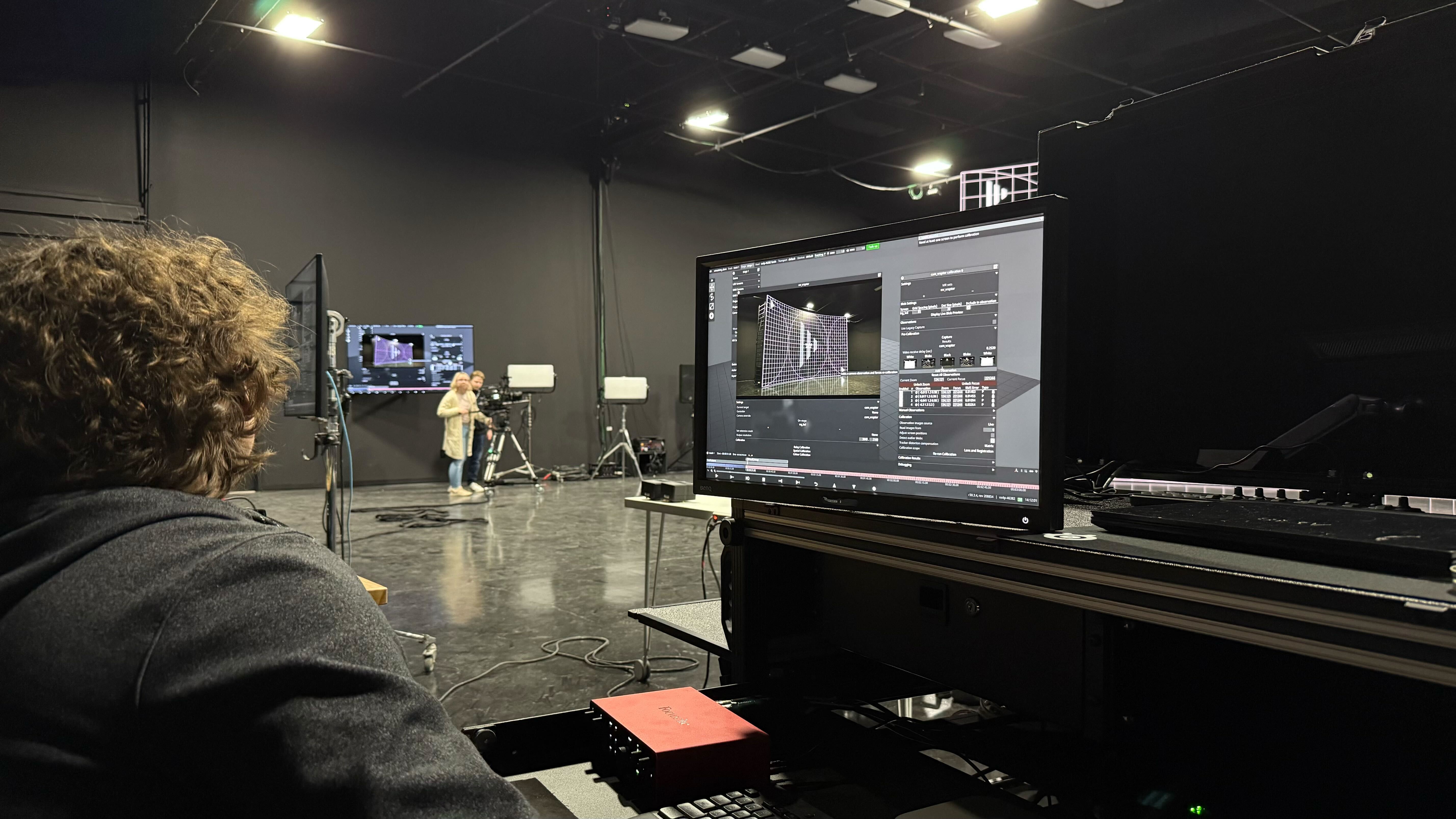 The TRG team learning how to use the Disguise system on their very own stage