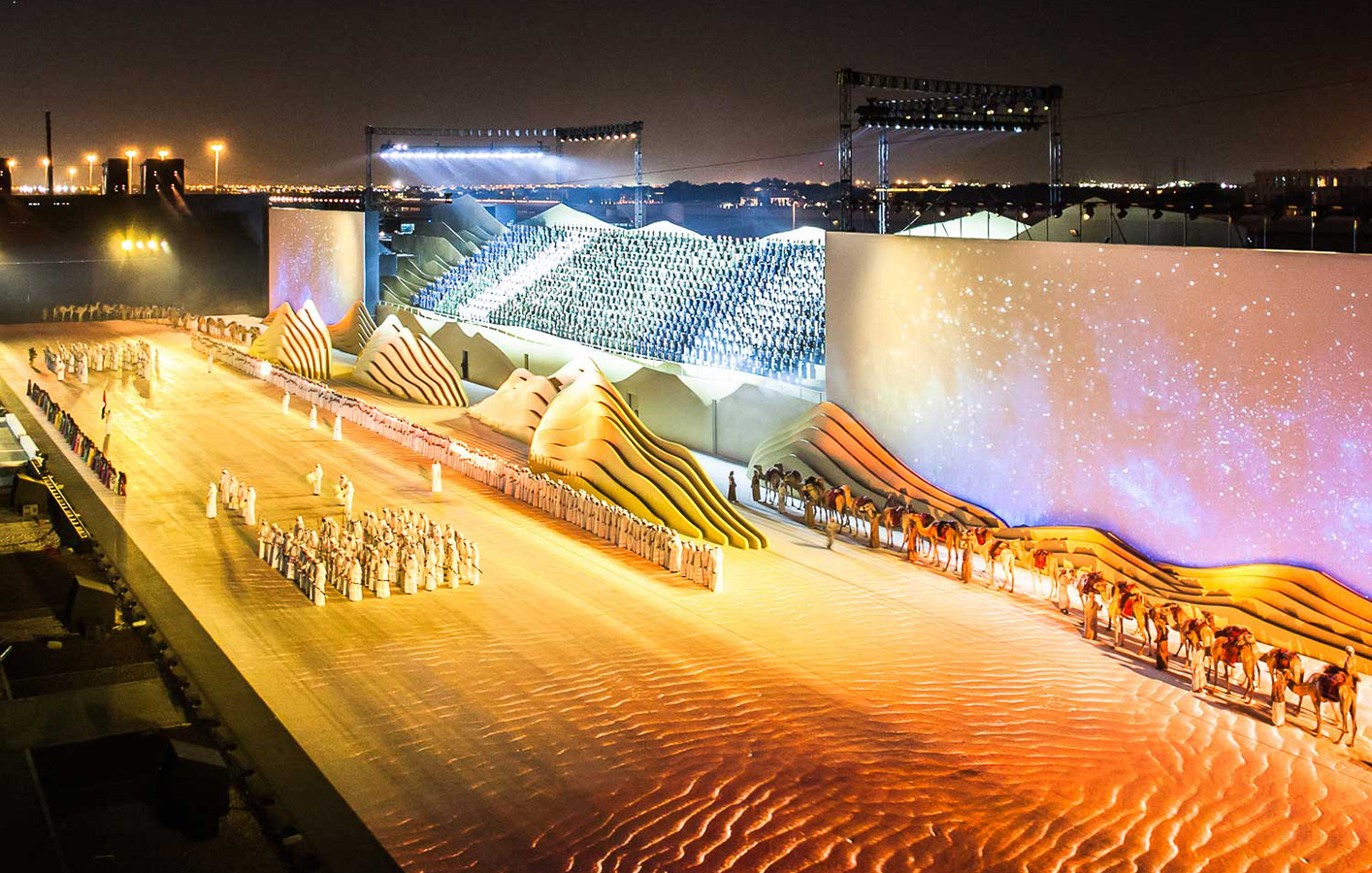 Group of people standing on stage in Middle East