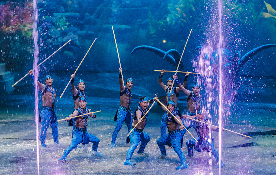 Group of performers in blue outfits for Stage production of Qing Show in China