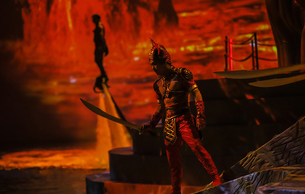 Man holding sword and wearing armour Stage production of Qing Show in China