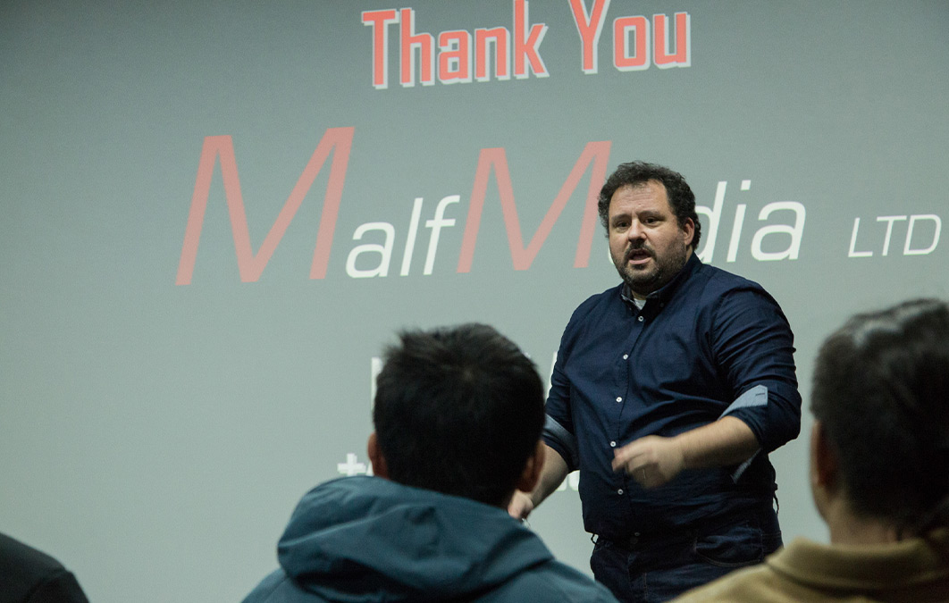 Man presenting on stage