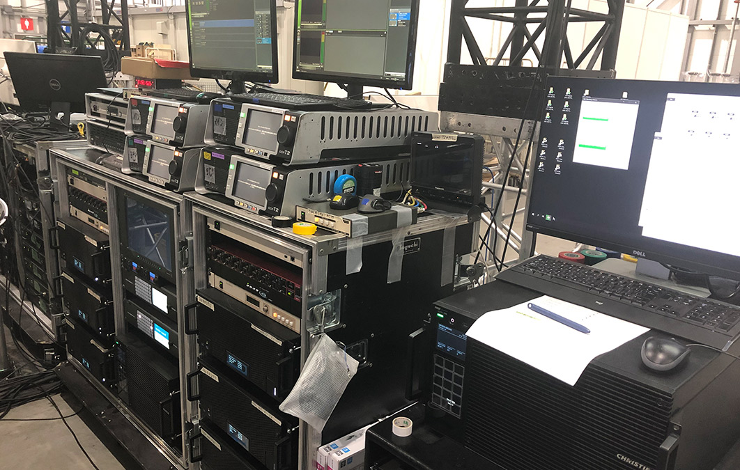 Servers and equipment backstage at event