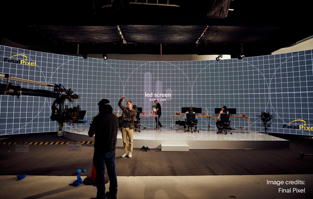 Crew members work on VP set