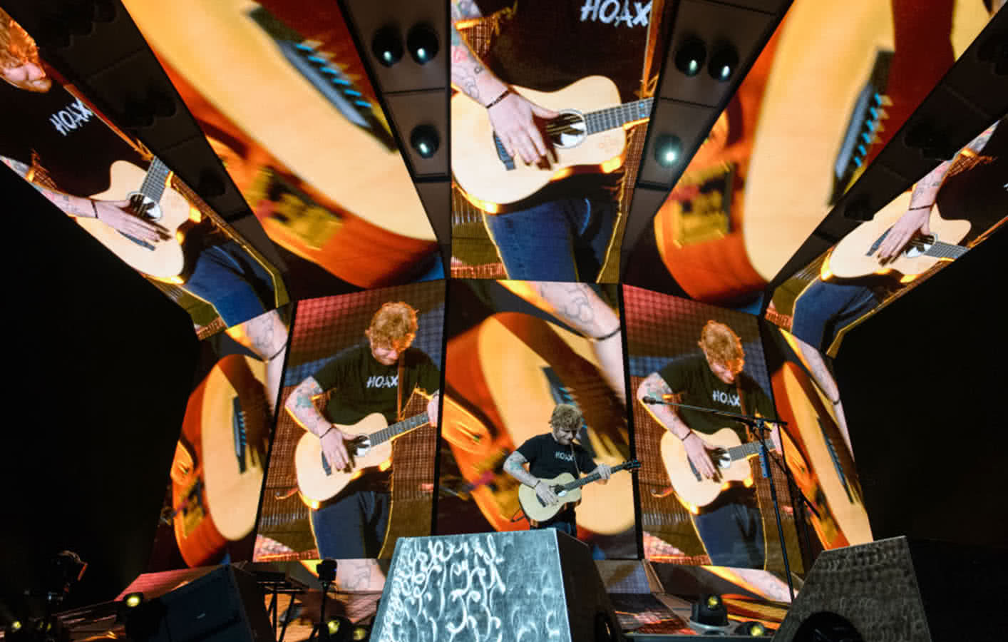 Dynamic LED stage design displays Ed Sheeran tapping his guitar