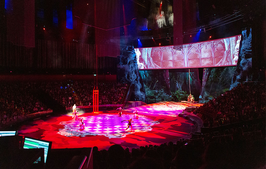 Group of performers dancing on stage for House of Dancing Water