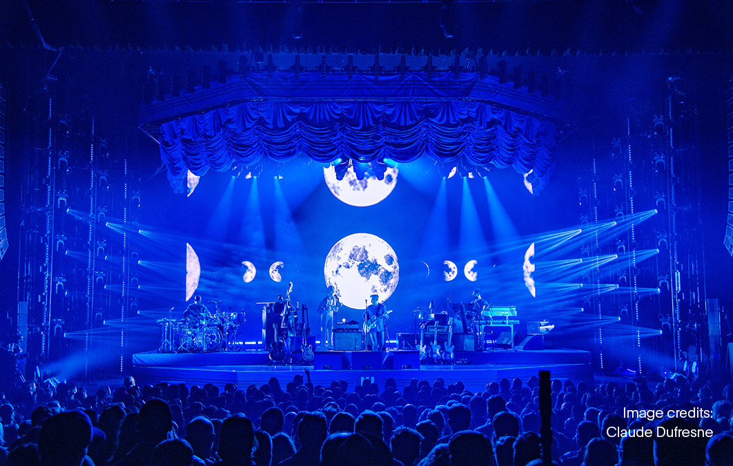 Moons displayed on screens for Jack White concert