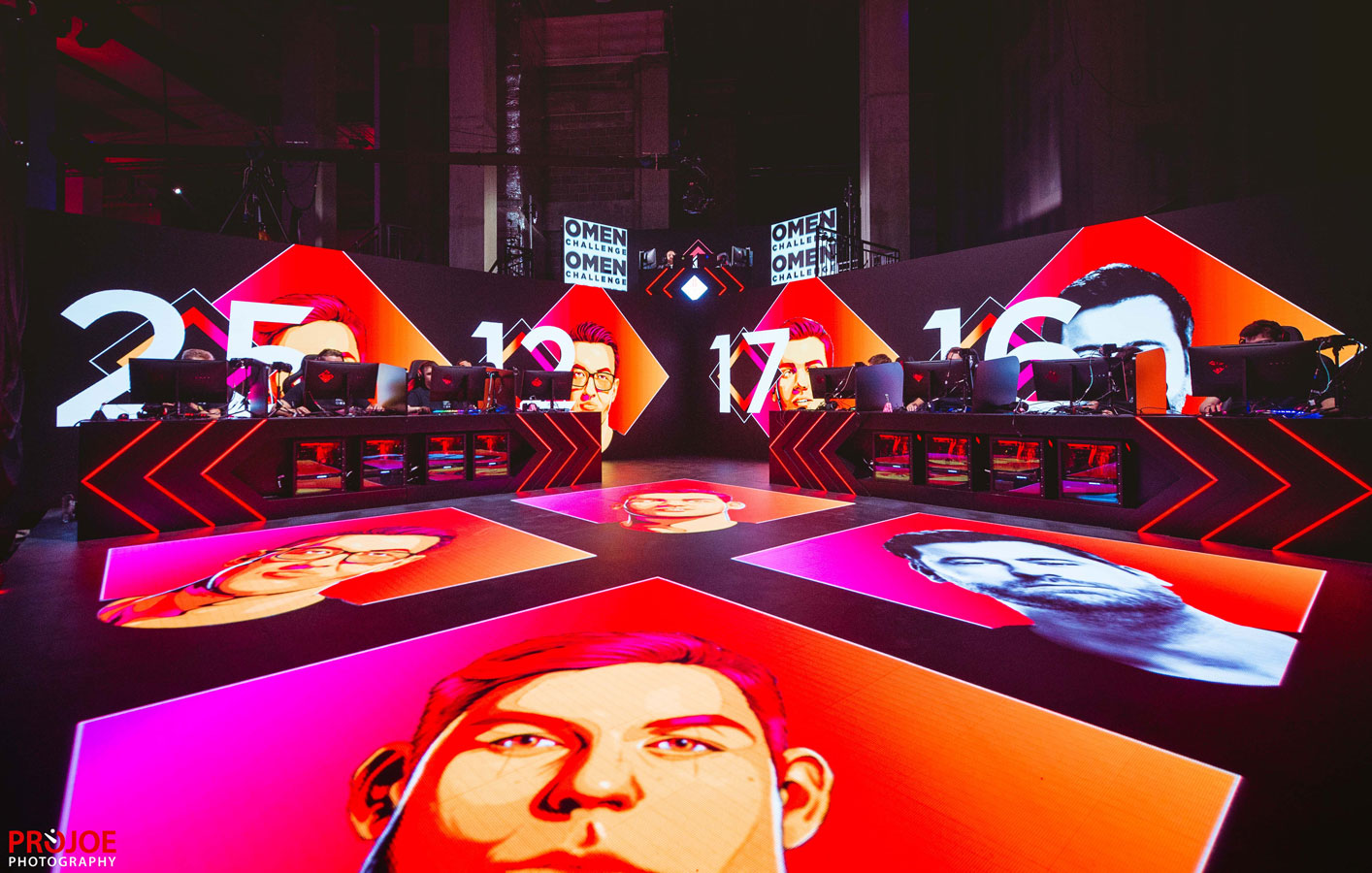 stage design for Omen esports event featuring players faces displayed on floor screens