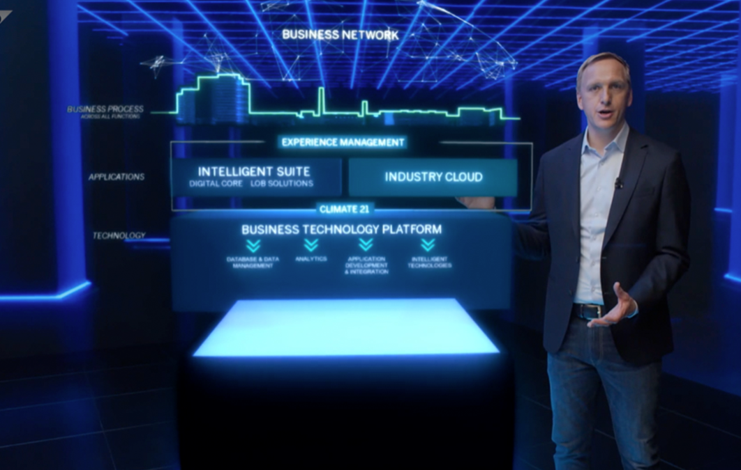 Man presenting next to AR graphics on business software