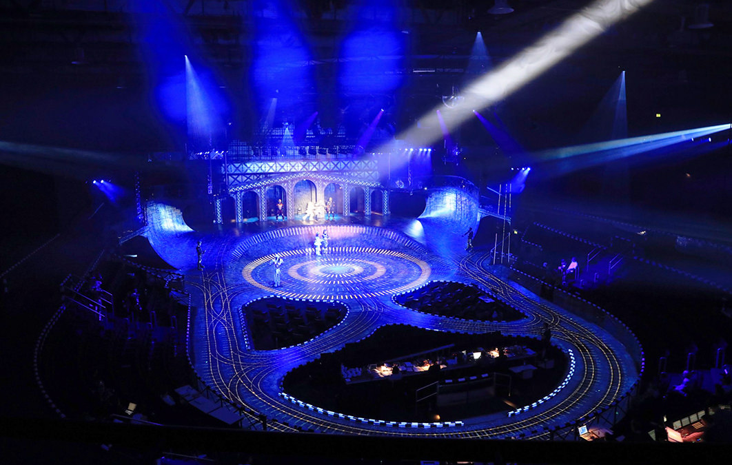 stage lighting shines on actors during performance of Starlight Express