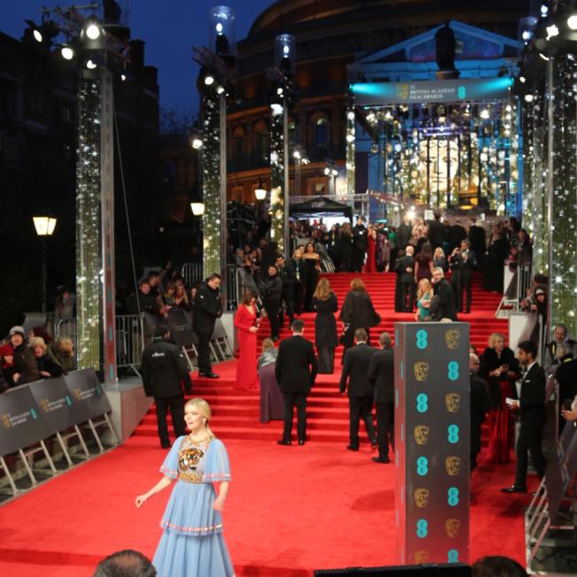 A young actress on the red carpet at BAFTAs