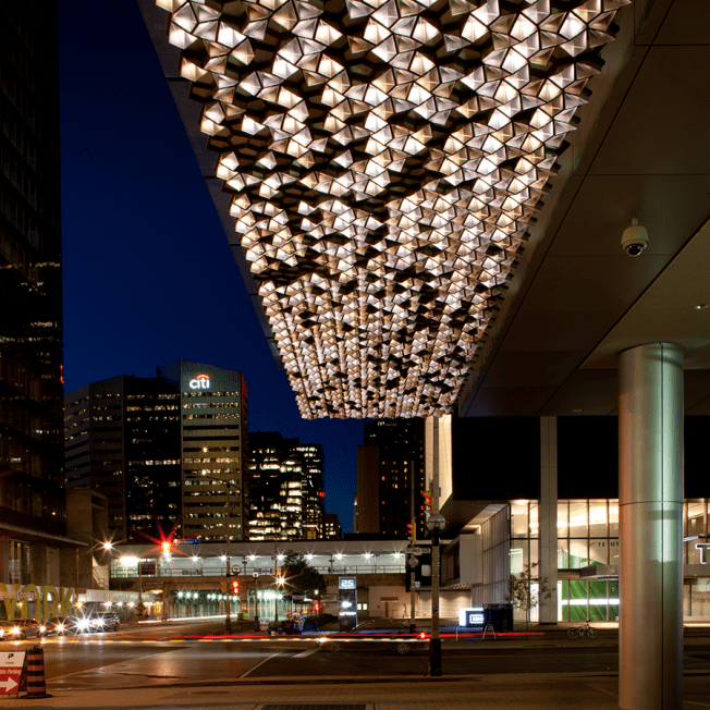 Lighting display hanging under building