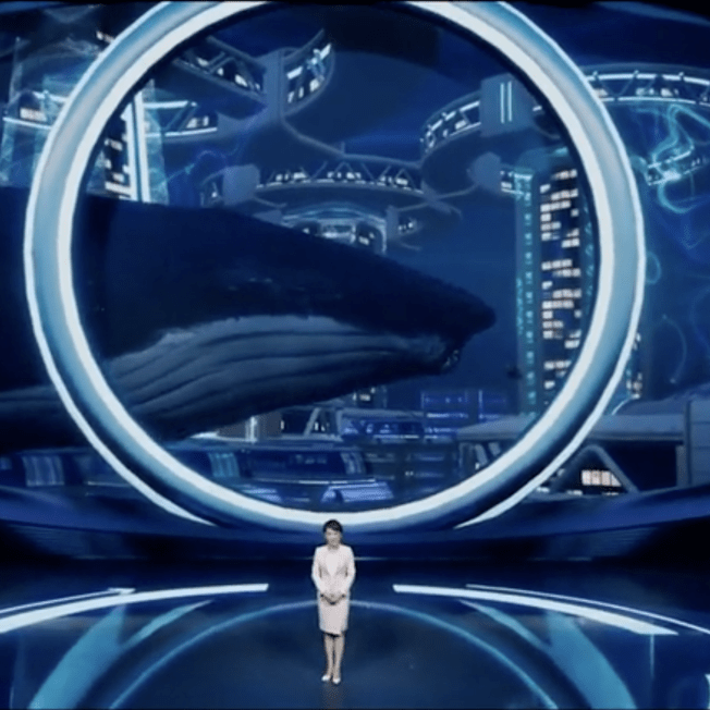 Women on virtual stage featuring an underwater environment