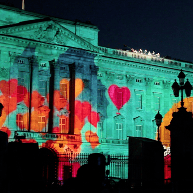 Multiple hearts projected on Buckingham Palace