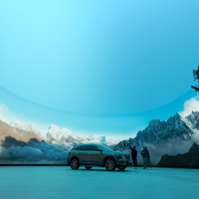 4x4 car on a curved LED stage