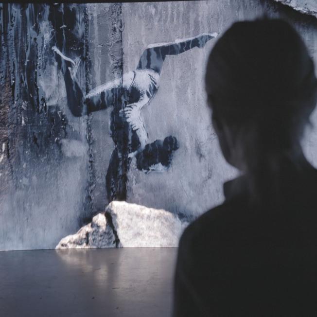 Person looking at mural