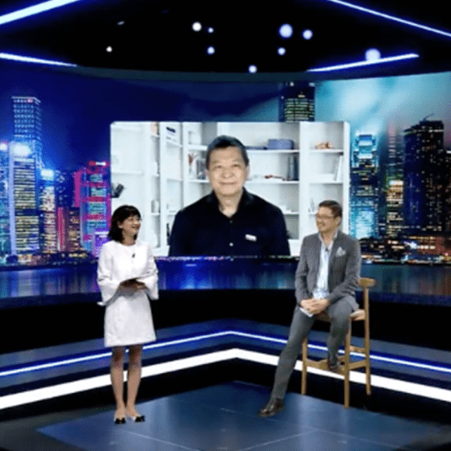 Presenters conduct remote interview on virtual stage 