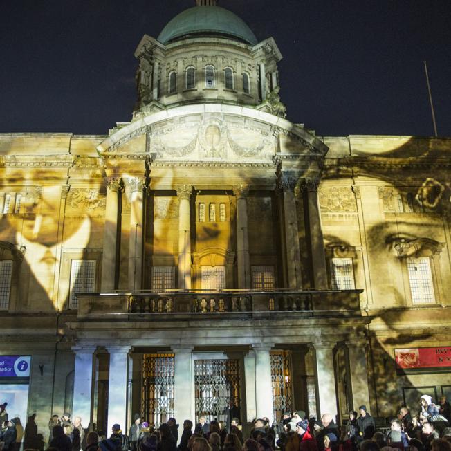 Historical figures projected on building in Hull