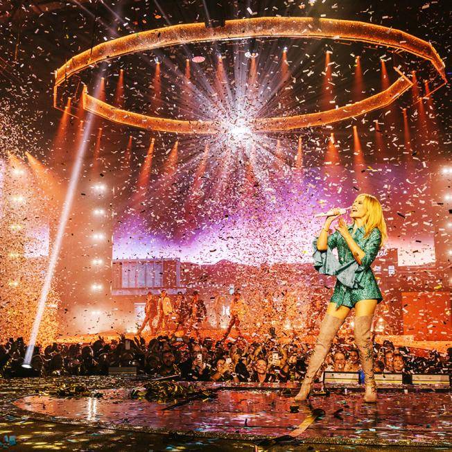 Kylie Minogue singing live on stage