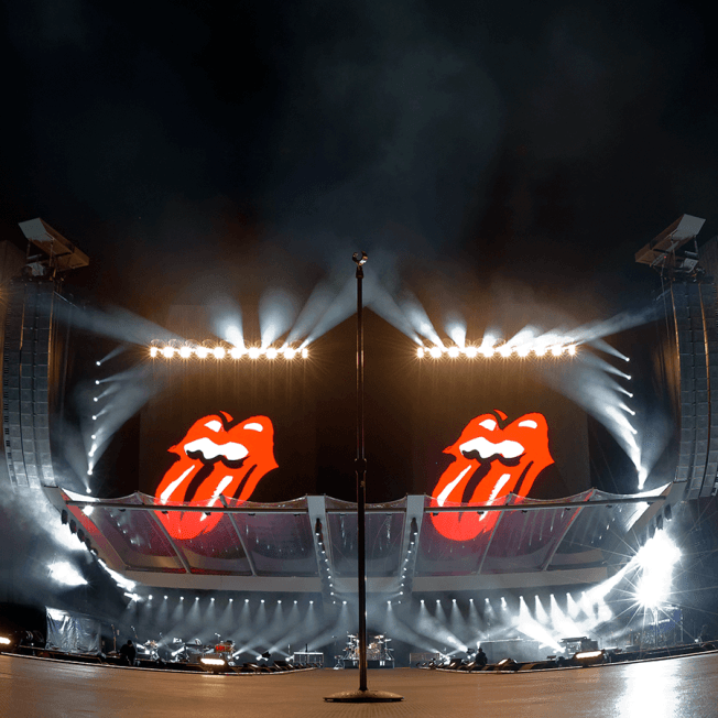 Stage set with Rolling Stones tongue logo displayed on screens