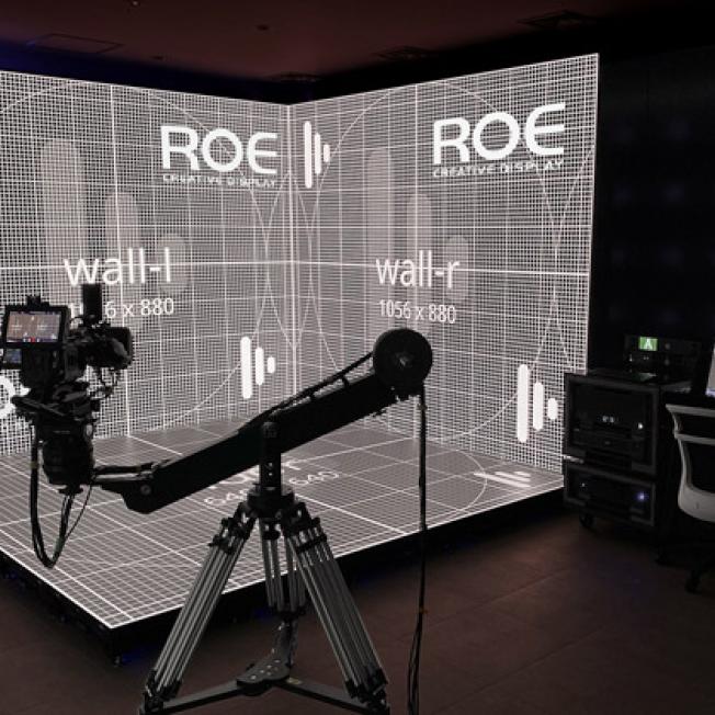 LED stage with Disguise and Roe branding