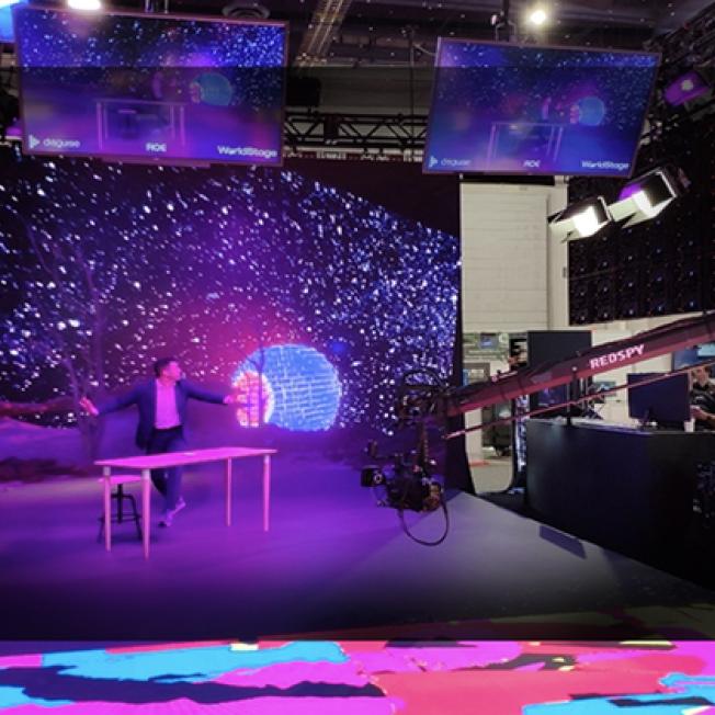 Man presenting on xr stage in out of space environment