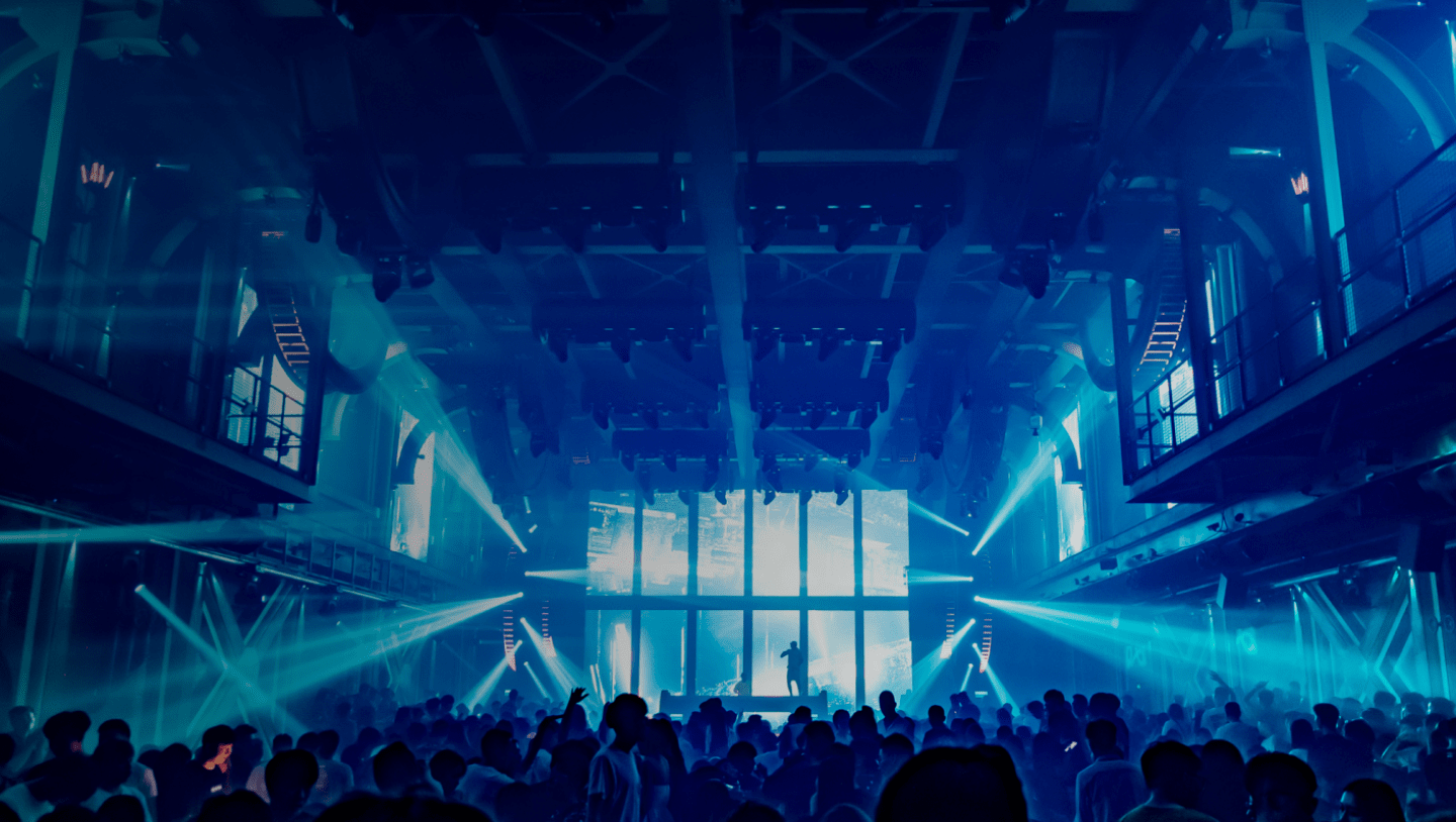 DJ act performing in front of led stage