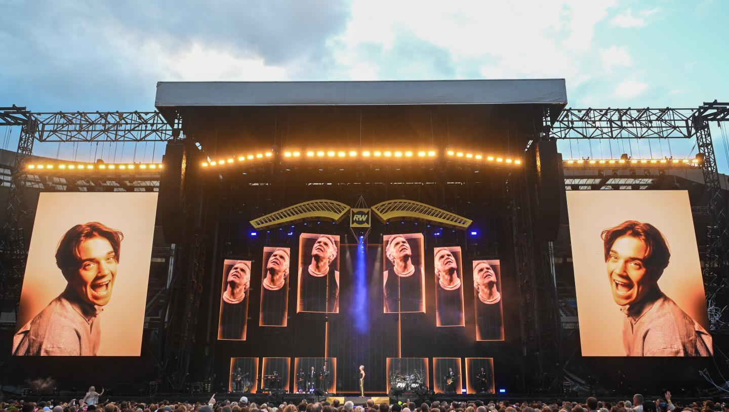 Robbie Williams Disguise Concert 