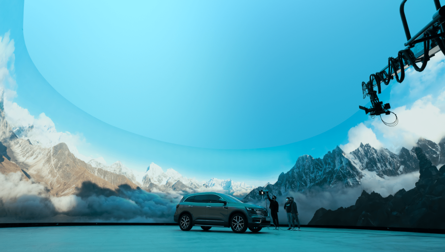 4x4 car on a curved LED stage