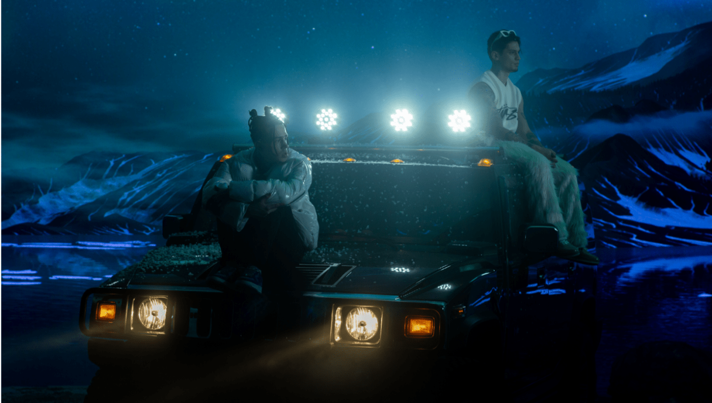 Rappers Reckol and Cakal sit on car on virtual production set