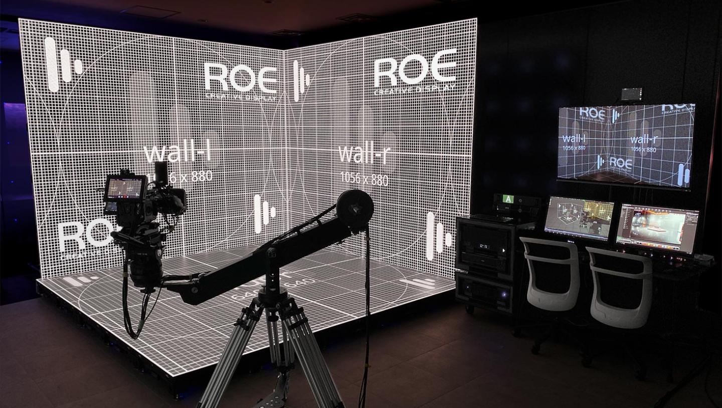 LED stage with Disguise and Roe branding