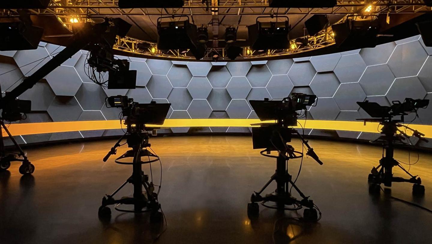 Cameras in front of wrapped LED stage