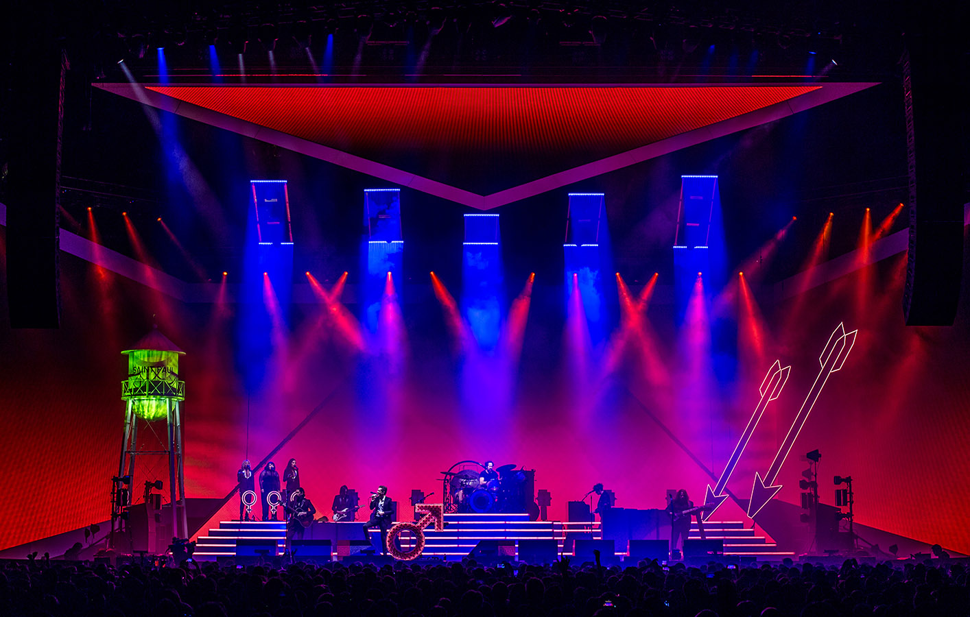 The Killers play on stage