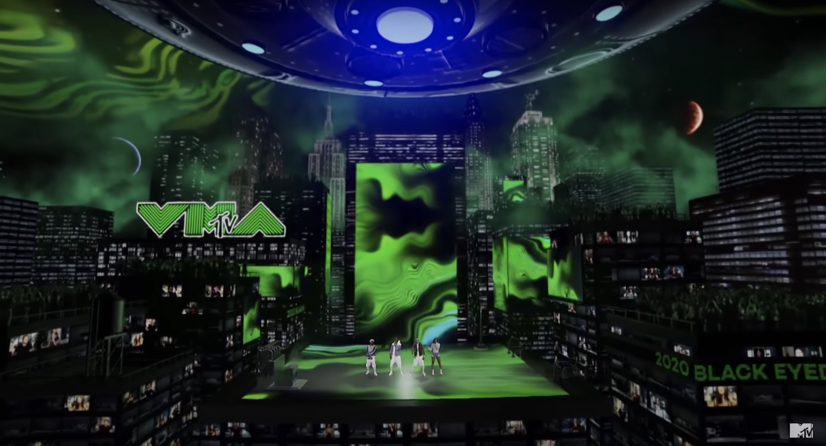 Black eyed peas perform on virtual stage